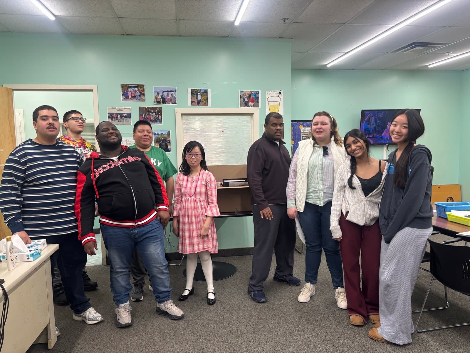 Group gathered together in a community activity room
